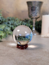 Load image into Gallery viewer, Quartz Crystal Ball with Wooden Stand - Treasures of The Moon
